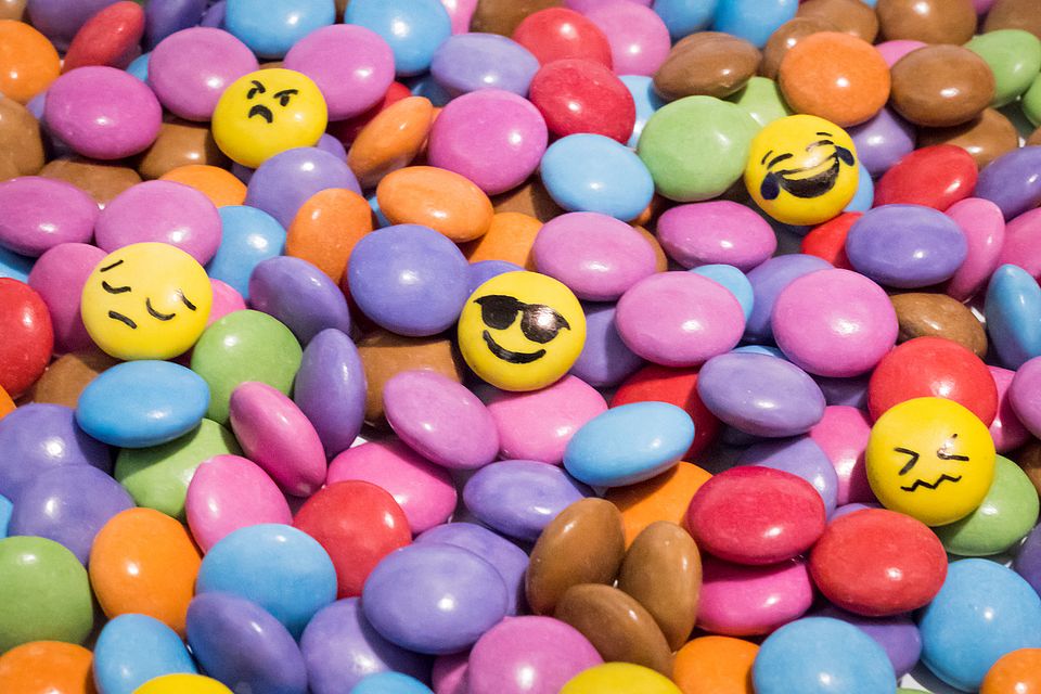 Colored candy with Emojies showing different emotions